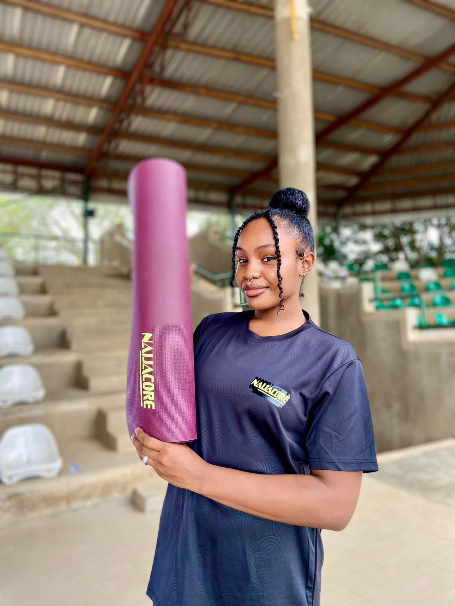 Castel with a yoga mat at a Dream Sports Africa session