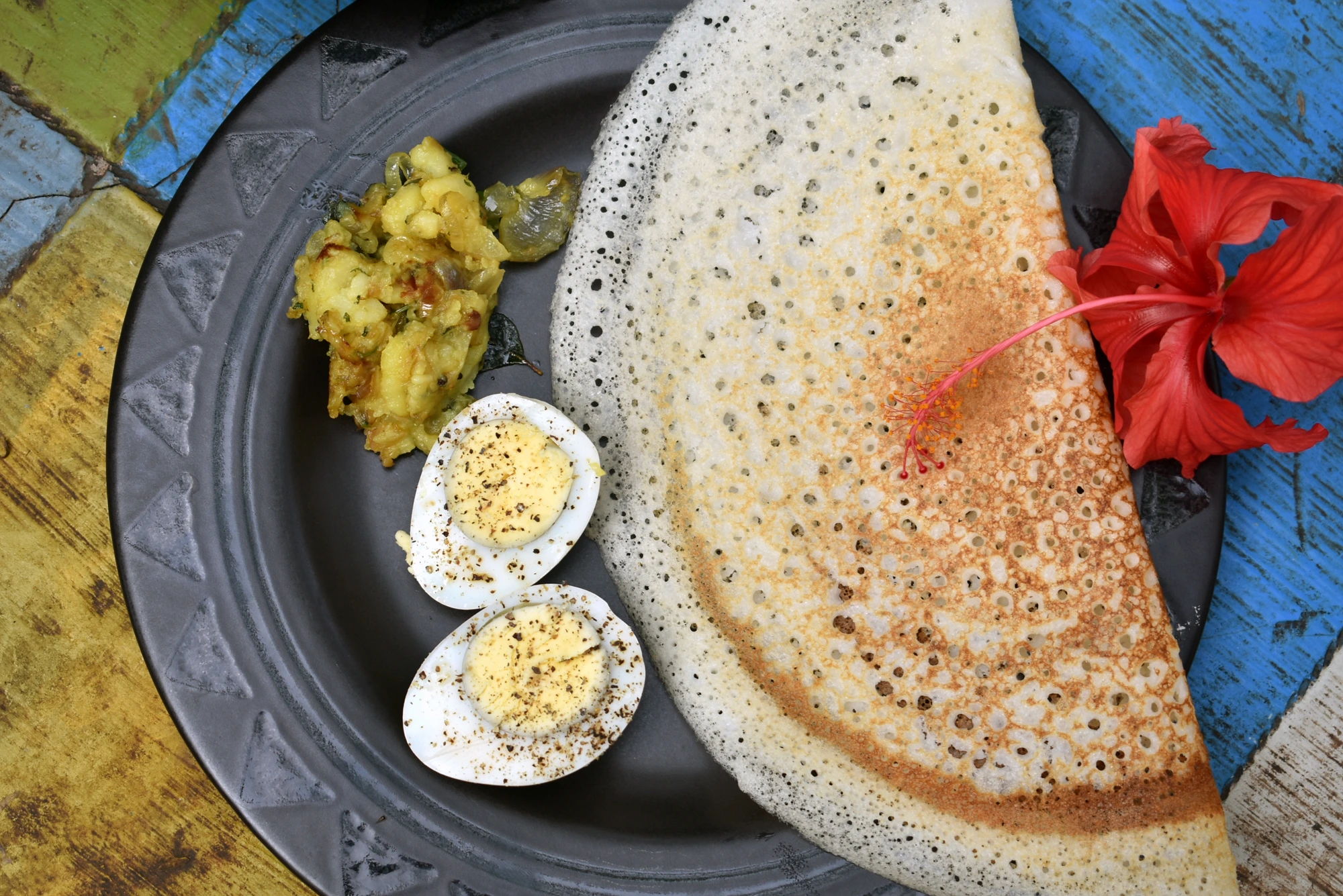 Breakfast — dosa, aloo bhaji and egg