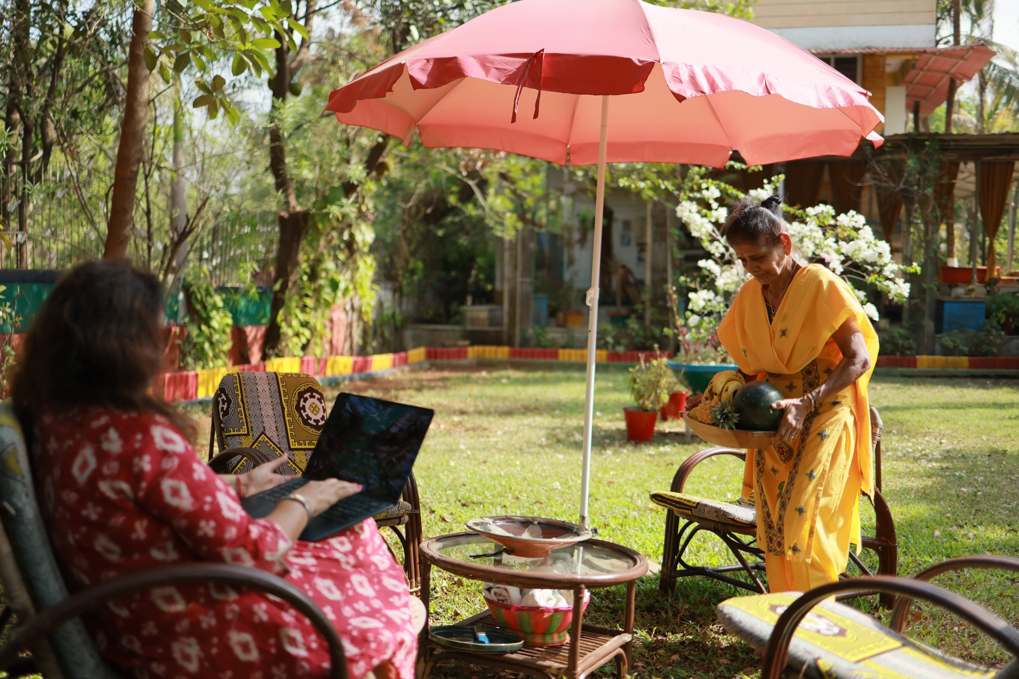 Fruit served under the pink umbrella