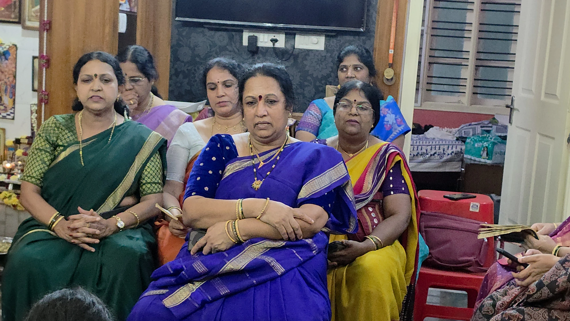 Devotees at a home parayana gathering in Bengaluru