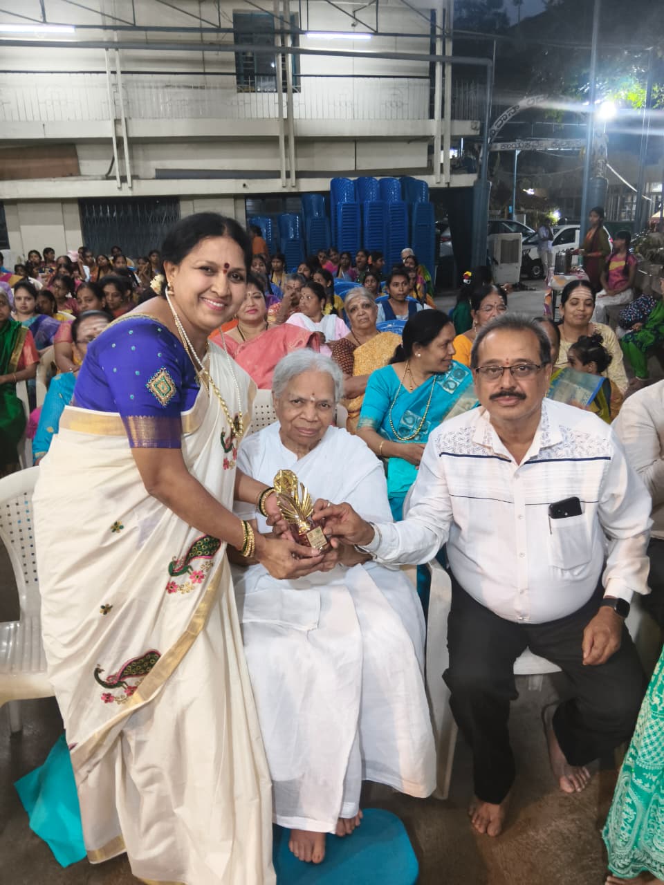 Group parayana participants together after the recitation in Bengaluru