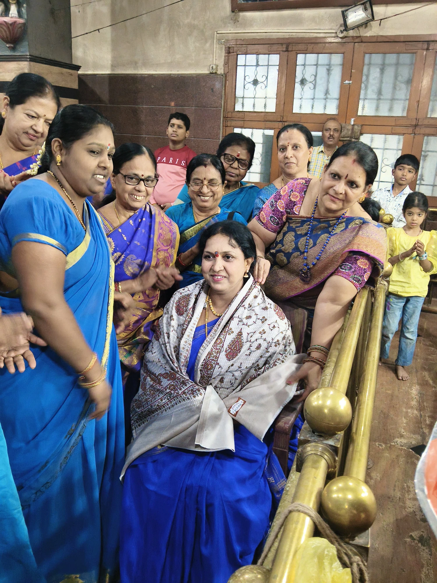 Group parayana on stage at a cultural centre in Bengaluru