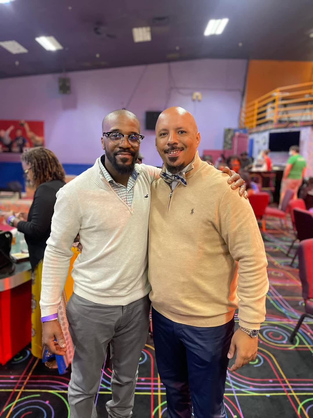Mason with a fellow bowler at a bowling center